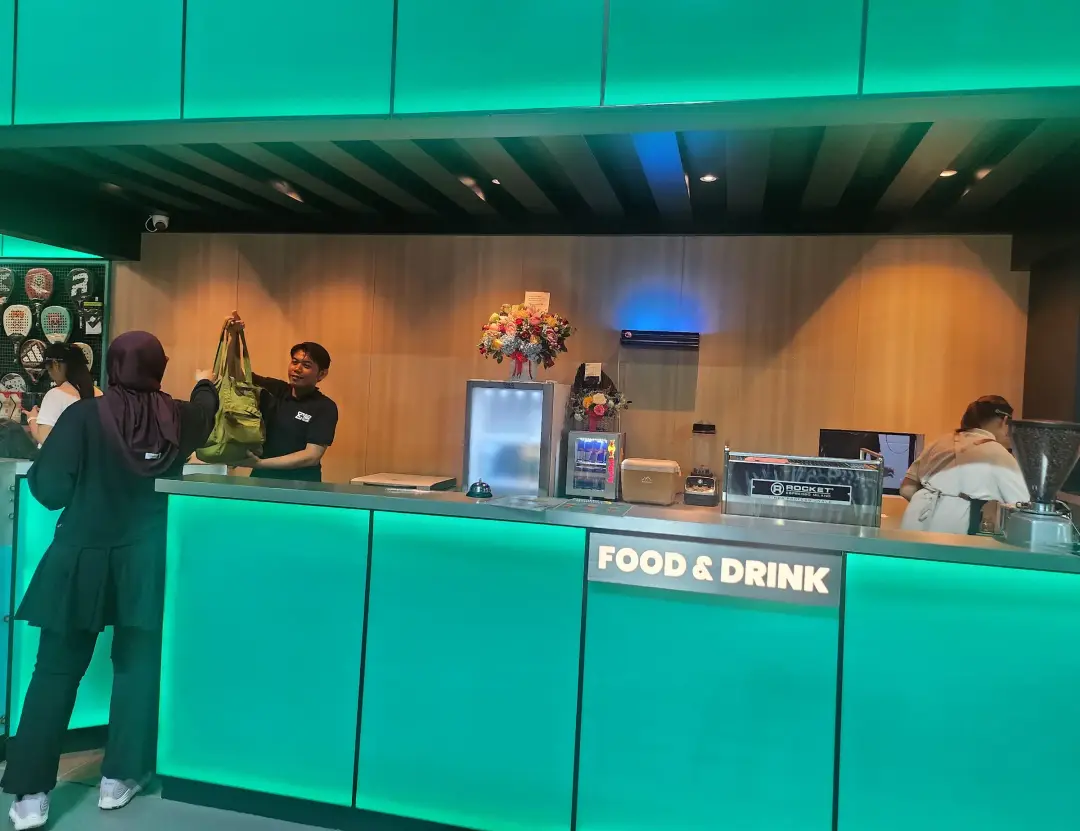Glowing teal food and drink bar