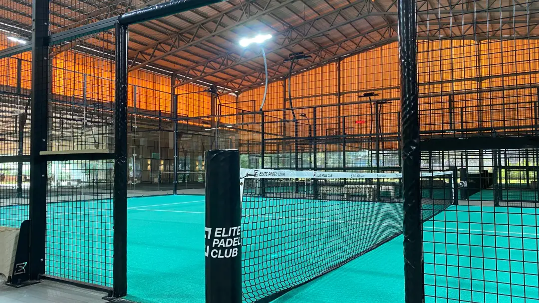 Teal courts at dusk